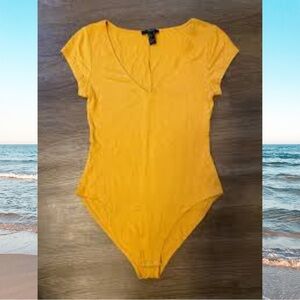 Forever 21 Golden Ribbed stand out yellow bodysuit Women’s size small